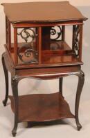 An Edwardian mahogany revolving bookcase