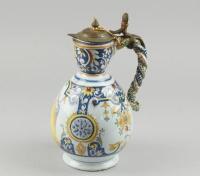 A Continental maiolica lidded jug