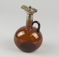 A Victorian brown glass liqueur decanter