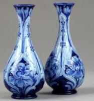 A pair of James McIntyre Co Ltd Florianware vases