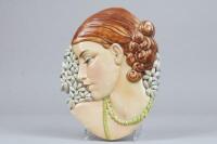 A Beswick 1930's wall mask of the head of a young women