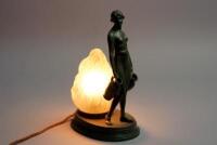 An early 20thC figural table lamp