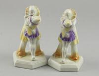 A pair of Pierrot clown pottery bookends