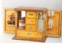 Edwardian oak smoking and drinking cabinet