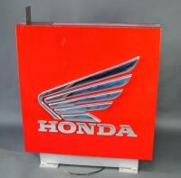 A Honda illuminating trade sign