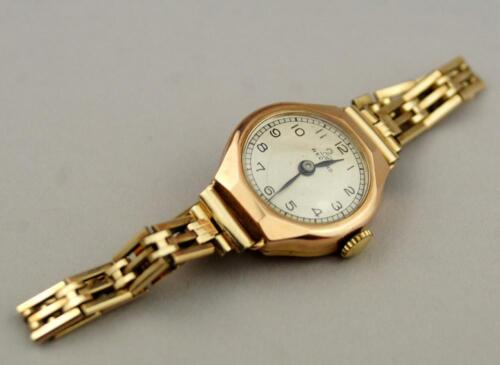 A 1940s 9ct gold Record by Longines ladies cocktail watch