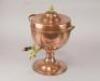 A brass and copper samovar