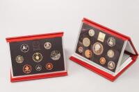 Four Royal Mint proof sets