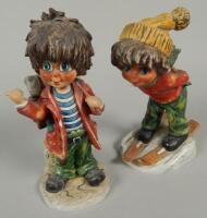 A pair of Goebel figures