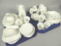 A large quantity of Shelley plain white glazed tea and coffee ware etc.