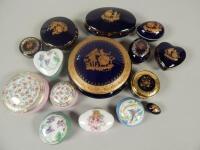 A large collection of 20thC Limoges porcelain boxes and covers