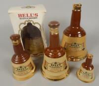 A collection of Bell's whiskey decanters