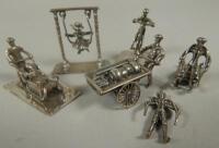 A collection of six silver miniature items