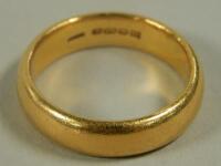 A 22ct gold thick wedding band