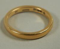 A 22ct gold wedding band