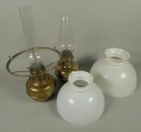 Two late 19thC / early 20thC oil lamps