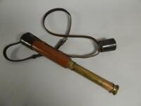 An early 20thC brass and leather telescope