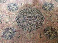 28.8.14 - Vendor paid unsold fees £17.78. A large Eastern pattern machine woven carpet