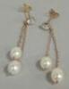 A pair of cultured pearl and zircon silver mounted double pendant drop earrings.