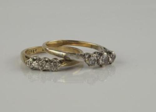 Two three stone rings