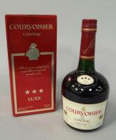 A bottle of Courvoisier Cognac.