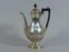 A silver part fluted coffee pot