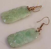 A pair of jade earrings