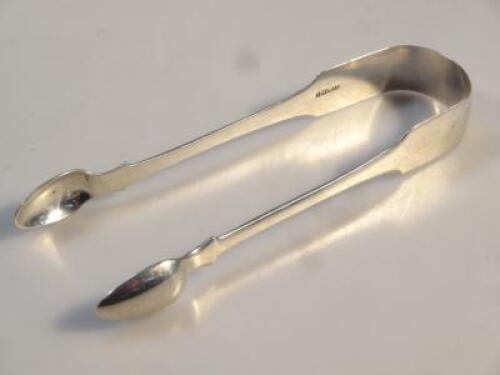 A pair of silver sugar bows