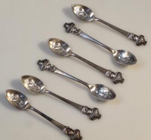 A set of six Continental white metal Rolex teaspoons