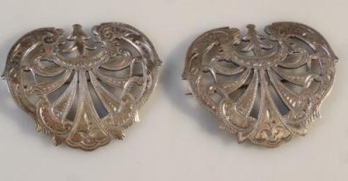 A pair of late Victorian silver nurse's buckles