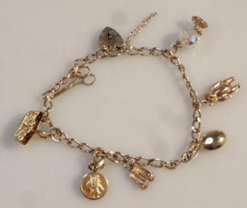 A 9ct gold charm bracelet