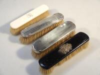 Two silver backed clothes brushes and two other early 20thC brushes. (4)