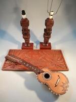 A pair of tribal carved wooden figures converted to table lamps