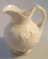 A Belleek cream jug