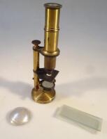 An early 20thC brass microscope