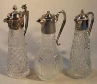 Three various cut glass and crystal claret jugs