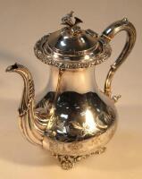 A silver plated coffee pot of circular bellied form