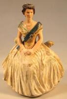 A mid 20thC plaster figure of Queen Elizabeth II