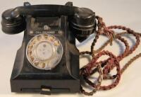 A GPO black bakelite telephone