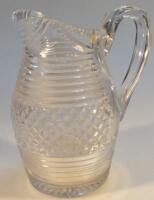 A cut glass water jug