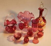 A quantity of cranberry and ruby glassware