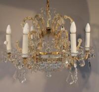 A 20thC cut glass six branch chandelier