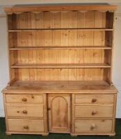 A reconstituted stripped pine dresser