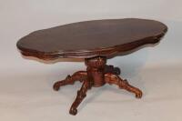 A 20thC mahogany finish coffee table