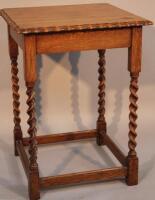 A 1920s oak pie crust table