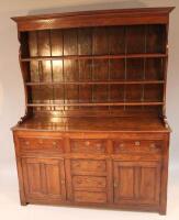 A late 19thC or early 20thC oak dresser