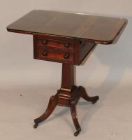 An early 19thC rosewood drop leaf table