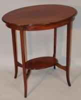 An Edwardian mahogany occasional table