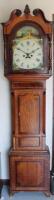 A 19thC oak and mahogany longcase clock