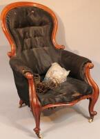 A Victorian mahogany spoon back armchair